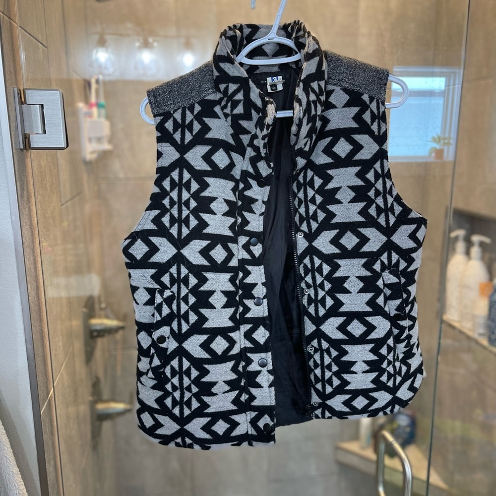 Black and gray vest